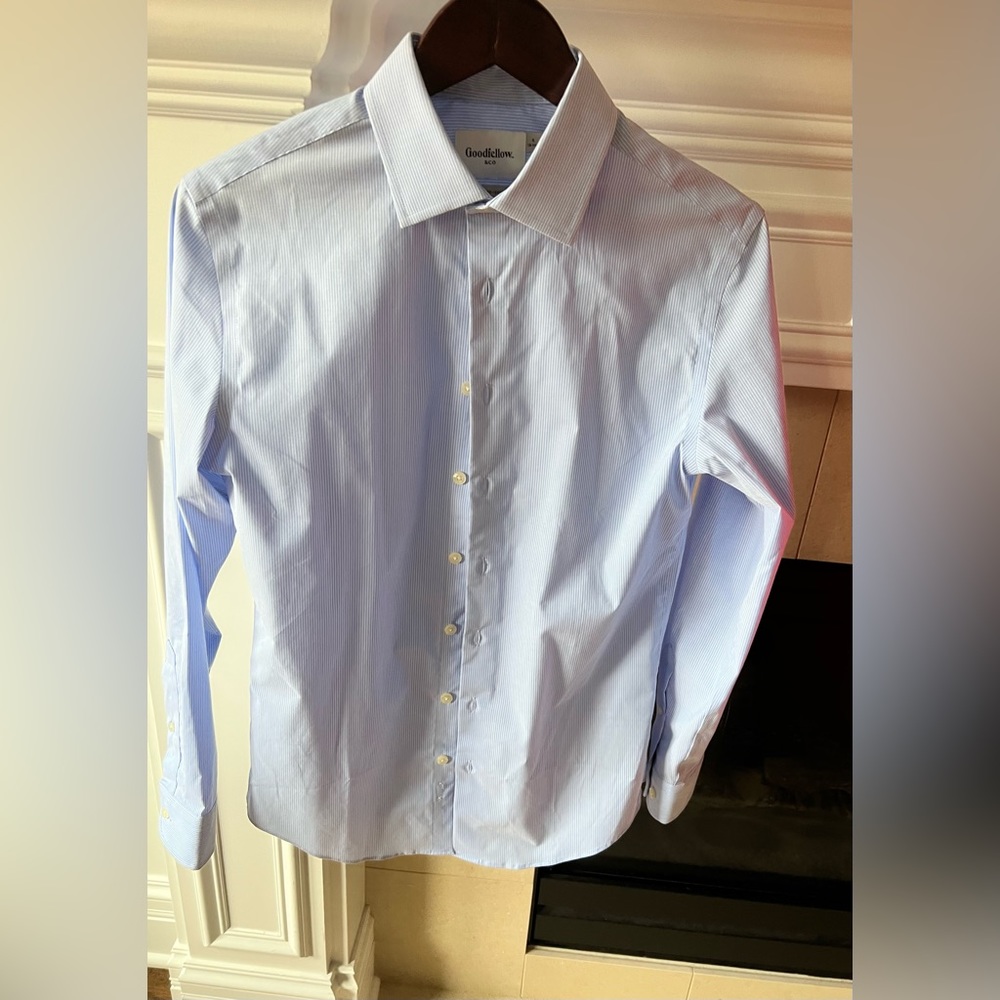Classy beautiful blue and white pin striped button down dress shirt.